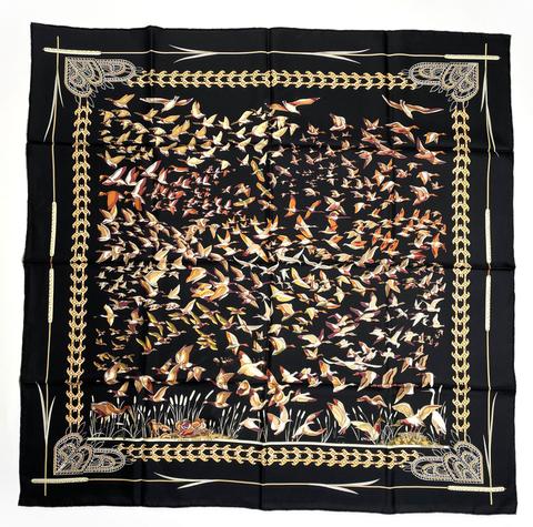 A variation of the Hermès scarf `Libres comme l'air ` first edited in 2003 by `Annie Faivre`