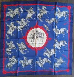 A variation of the Hermès scarf `Le nouveau manège` first edited in 1962 by `Françoise De La Perriere`