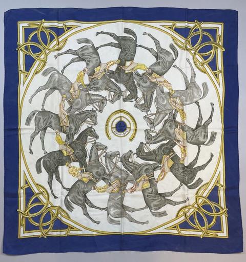 A variation of the Hermès scarf `La ronde des jockeys ` first edited in 1969 by `Françoise De La Perriere`