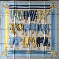 A variation of the Hermès scarf `Sangles ` first edited in 1985 by `Joachim Metz`