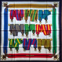 A variation of the Hermès scarf `Sangles ` first edited in 1985 by `Joachim Metz`