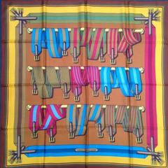 A variation of the Hermès scarf `Sangles ` first edited in 1985 by `Joachim Metz`