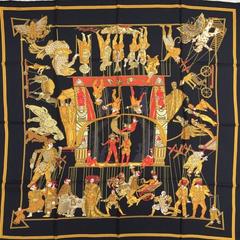 A variation of the Hermès scarf `Le temps des marionnettes ` first edited in 1996 by `Annie Faivre`