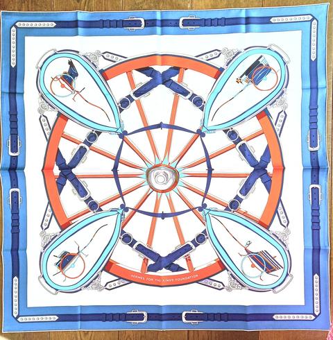 A variation of the Hermès scarf `En Roue Libre King's Foundation` first edited in 2025 by `Vladimir Rybaltchenko`