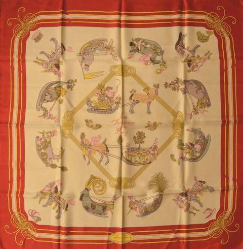 A variation of the Hermès scarf `Les fantaisies du roy ` first edited in 1986 by `Annie Faivre`